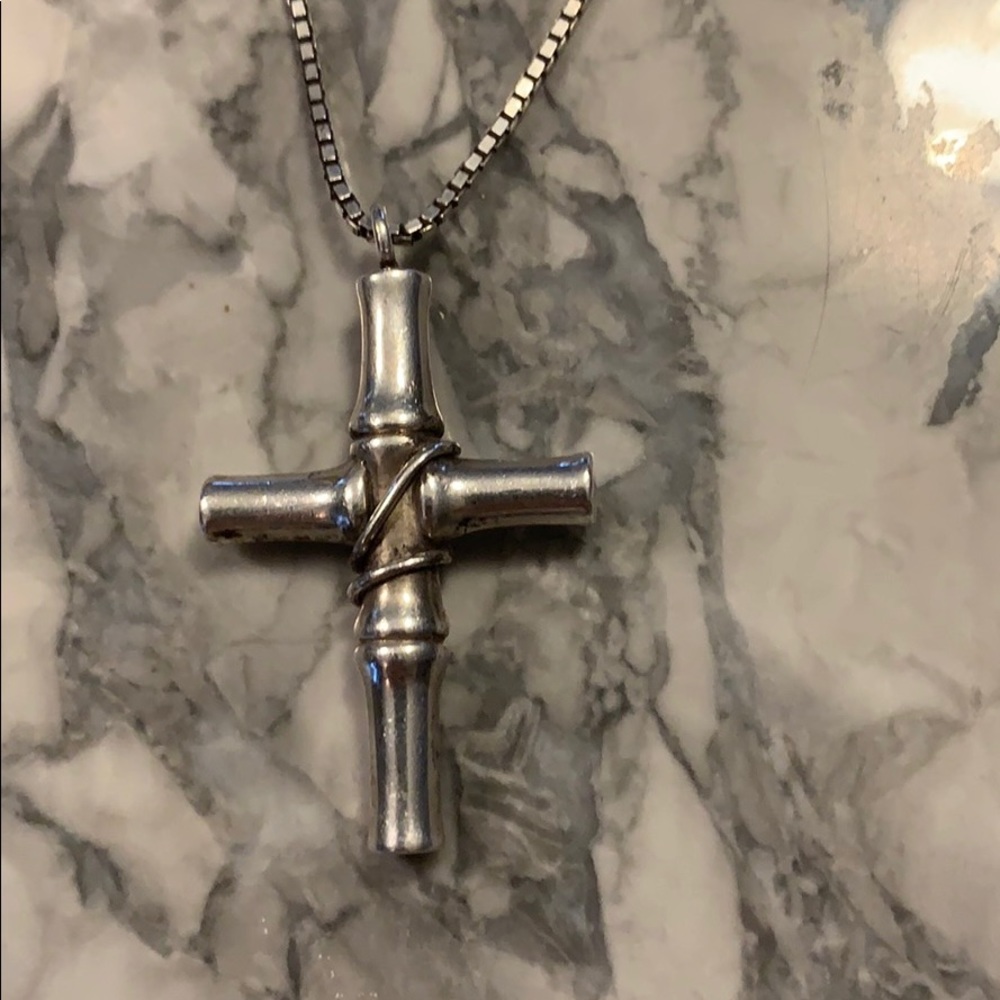 Gucci men’s cross and chain.